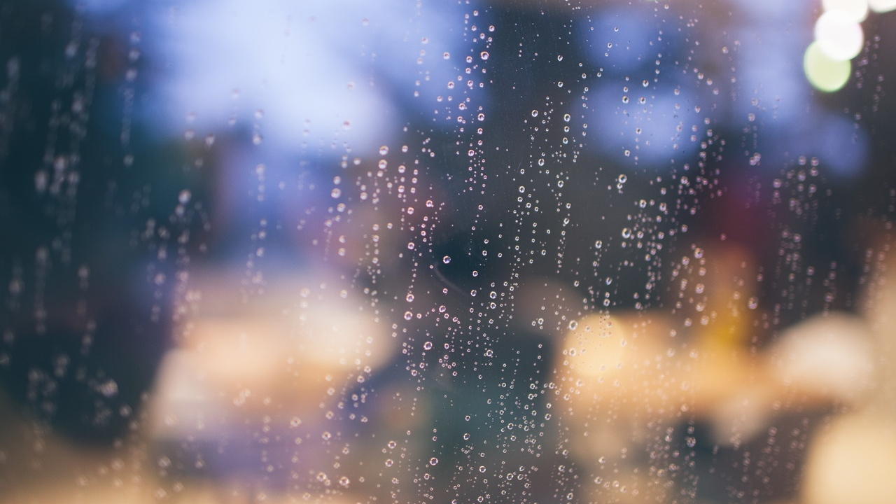 a window blurred by rain